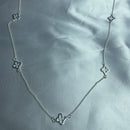 Colar Trevo Vazado Longo