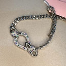 TORNOZELEIRA  FIVELA CRAVEJADA